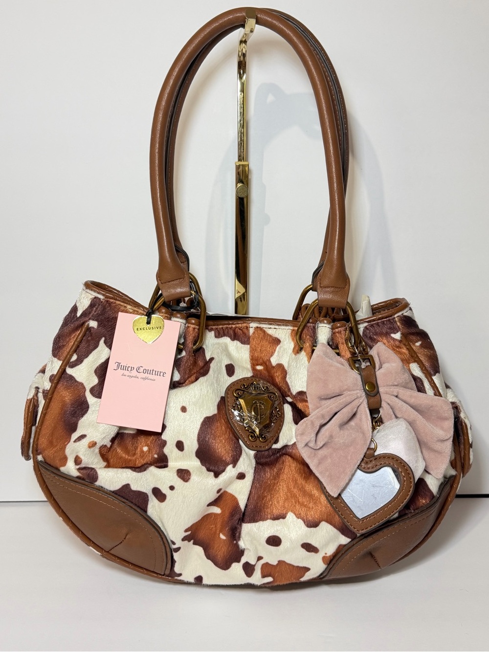 Juicy Couture Brown and Cream Cowhide Shoulder Bag with Bow Charm